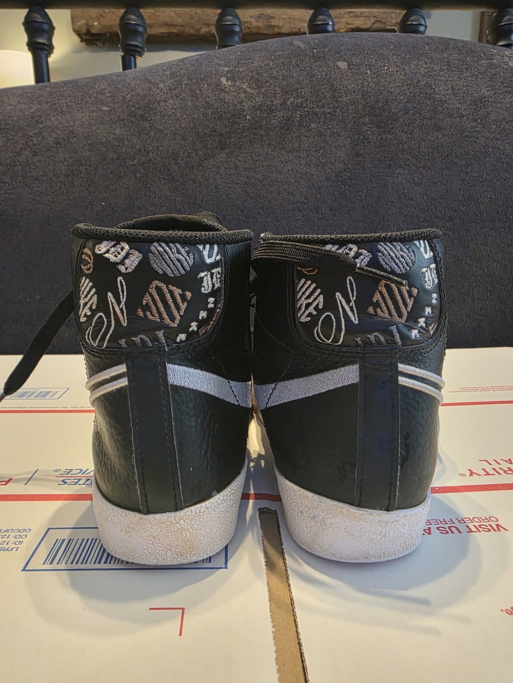 Nike Black High-Top Sneakers with Metallic Patterned Collar